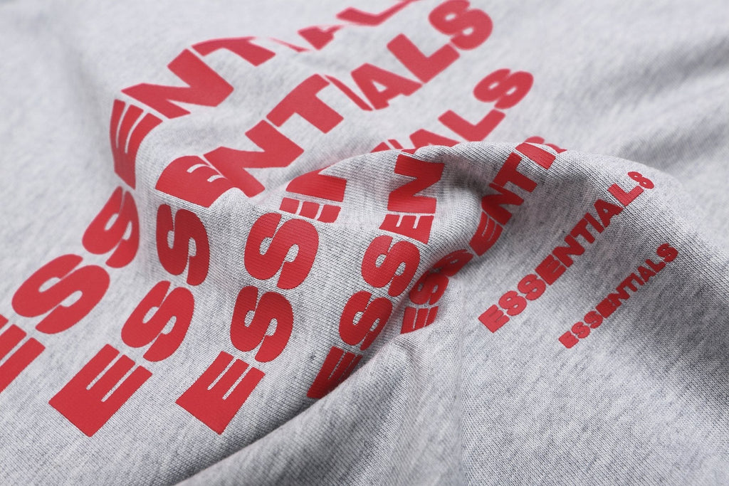 ESSENTIALS Repeated Graphic Short-Sleeve T-Shirt